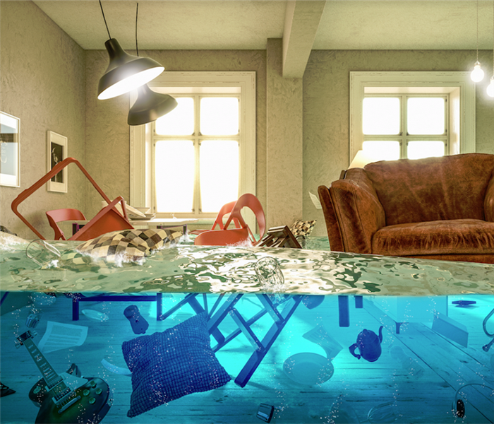 a flooded living room with items floating everywhere